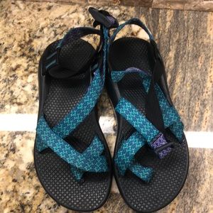 Purple and teal chacos size 5